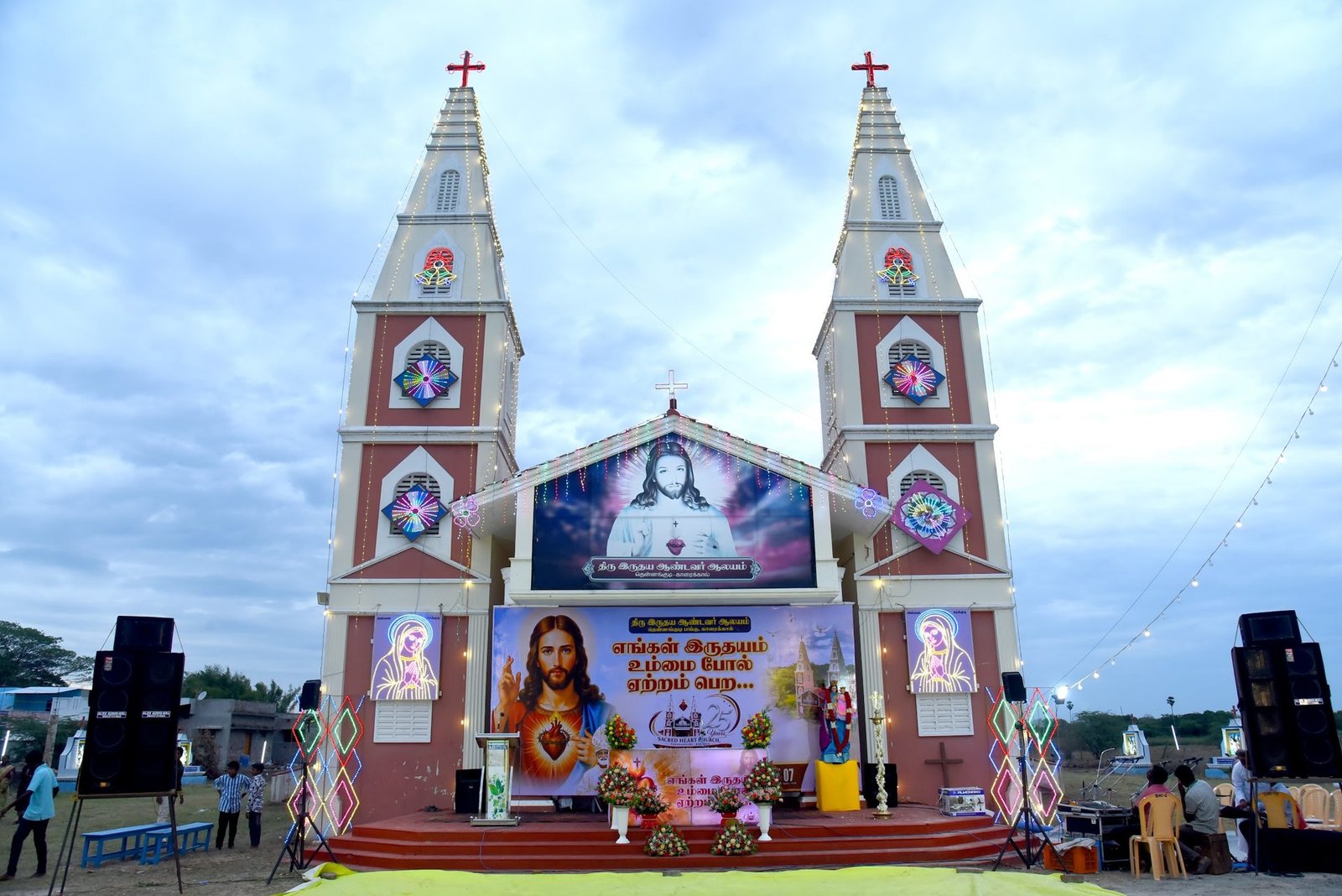 Sacred Heart Church, Thennangudi — twin-spired façade decorated for the Silver Jubilee
